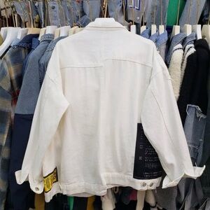 White Denim Jacket with Black Patch